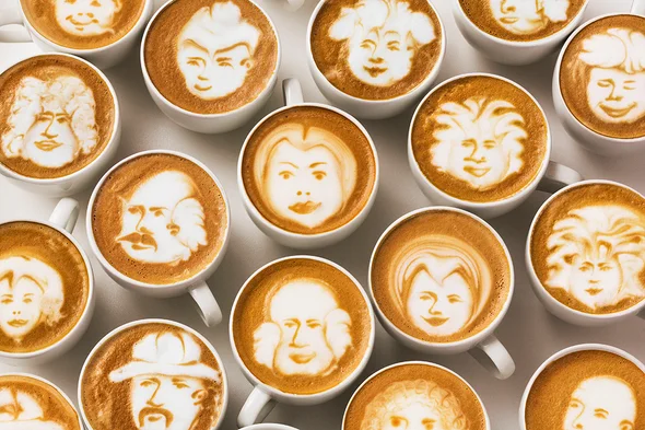 coffee mugs with different faces created in foam